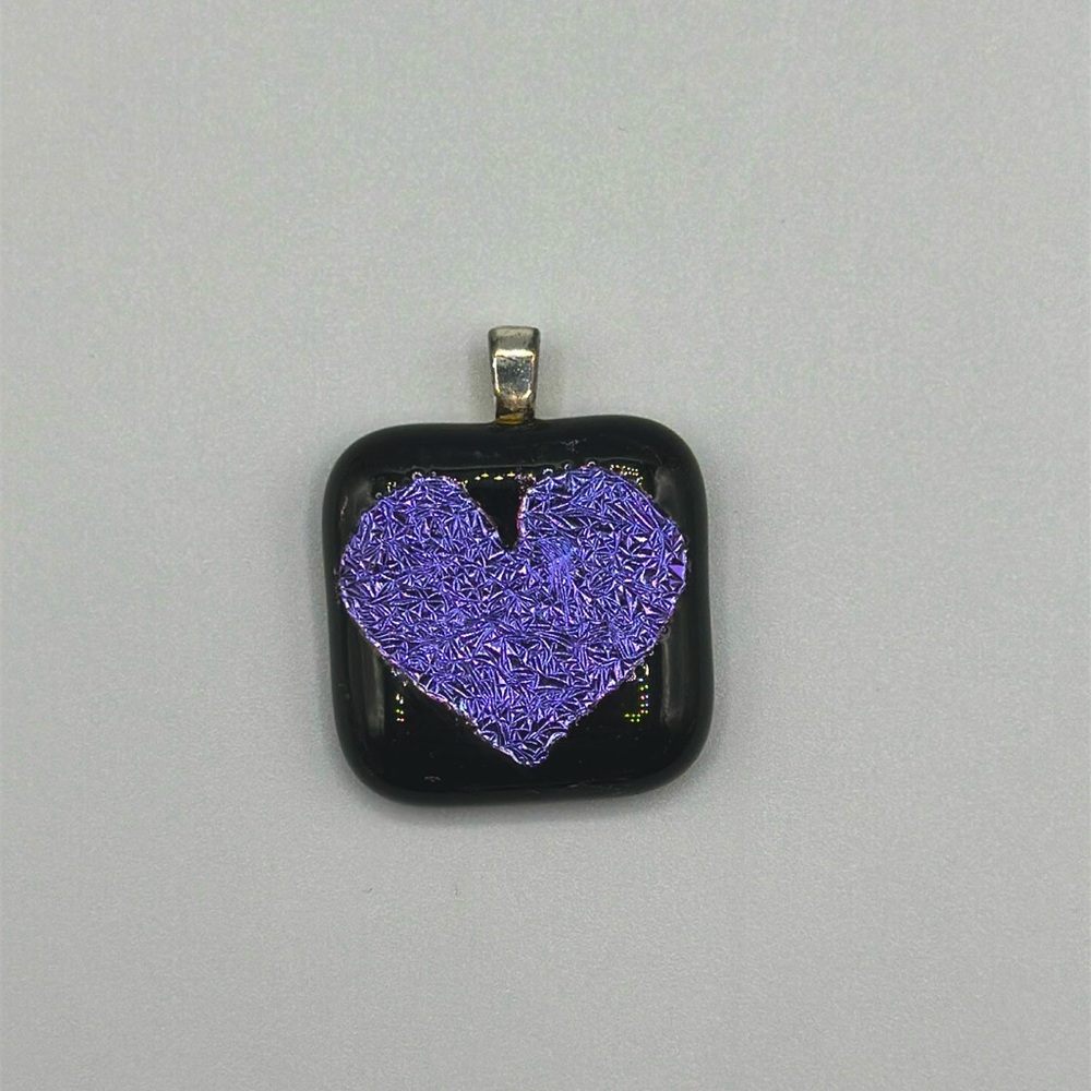 Artisan handmade glass pendant.